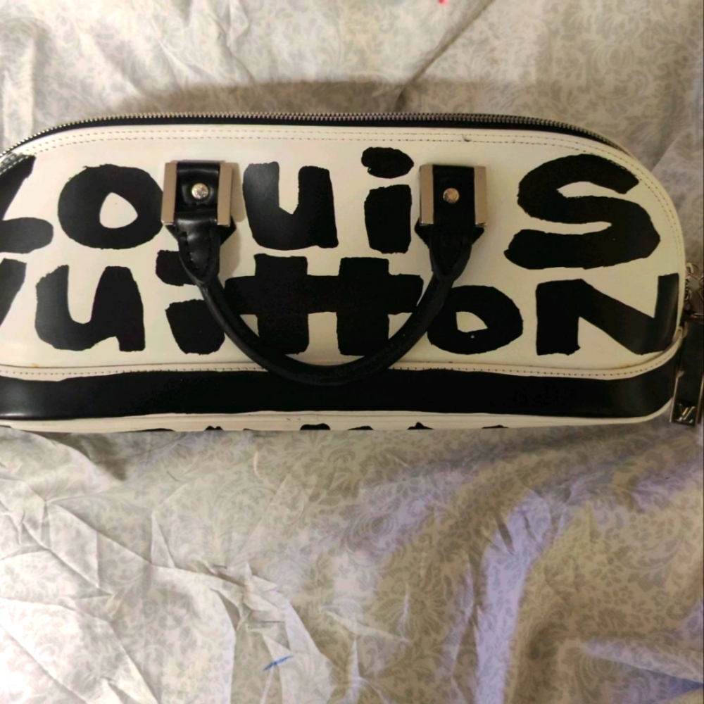 Louis Vuitton Alma Graffiti leather handbag